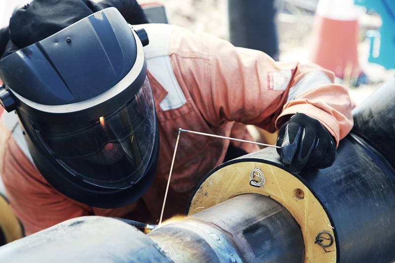 Pipes being welded together