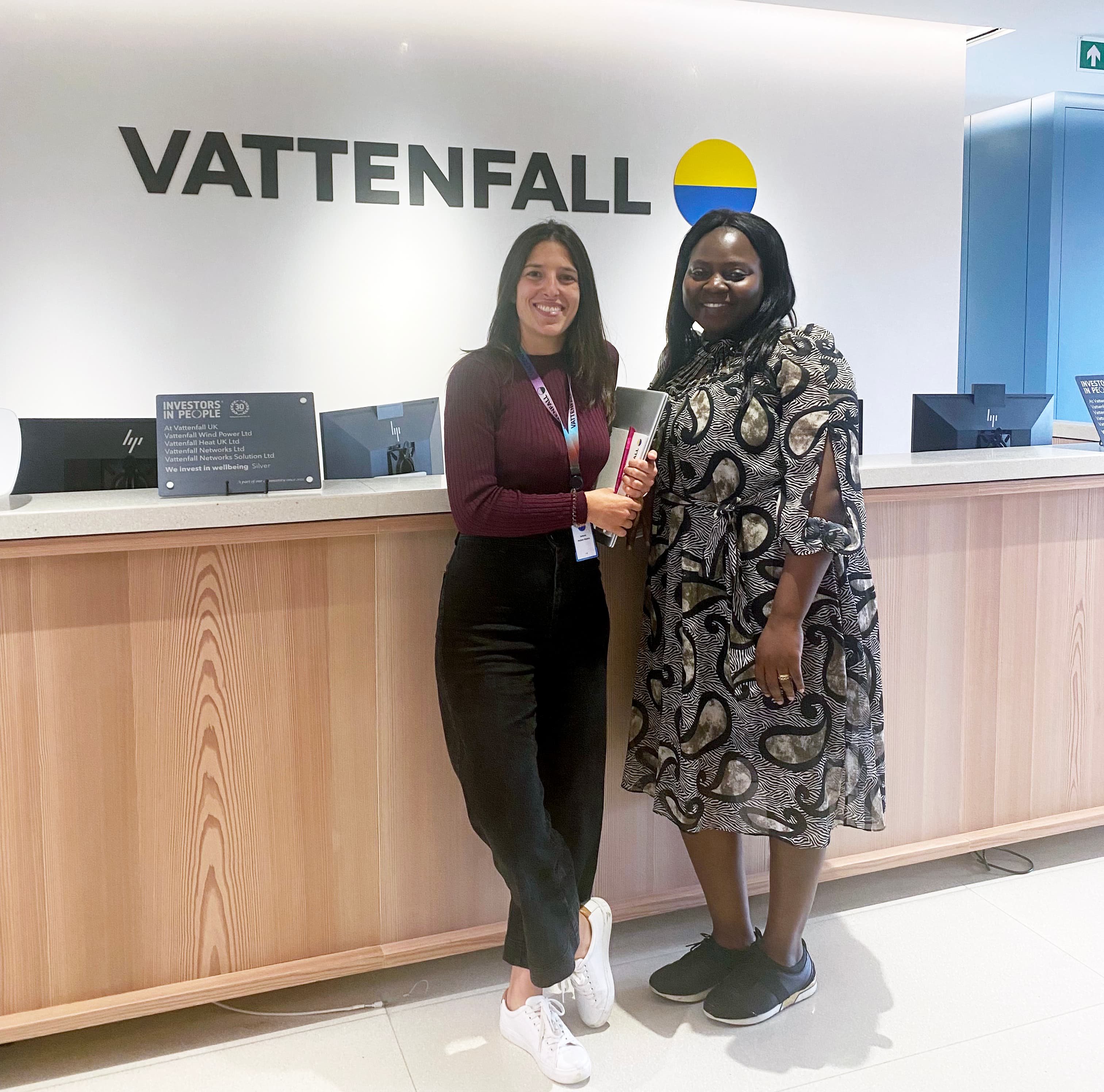 Two women standing at the main desk at Vattenfall HQ